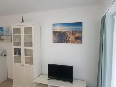 TV/Unterhaltungsangebot in der Unterkunft Gemütliches Apartment direkt am Strand