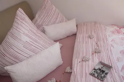 Ein Bett oder Betten in einem Zimmer der Unterkunft Ferienwohnung Konradi Cuxhaven-Duhnen