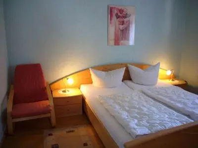 Ein Bett oder Betten in einem Zimmer der Unterkunft Apartment kleine Robbe