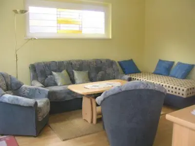 Ein Sitzbereich in der Unterkunft Apartment kleine Robbe