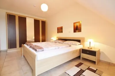Ein Bett oder Betten in einem Zimmer der Unterkunft Landhaus Hubertus, Whg 8