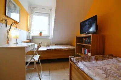 Ein Bett oder Betten in einem Zimmer der Unterkunft Landhaus Hubertus, Whg 8