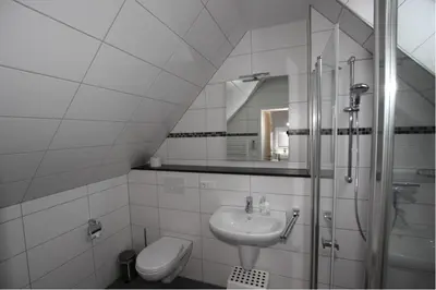 Ein Badezimmer in der Unterkunft Strand-Villa, Scharhörn