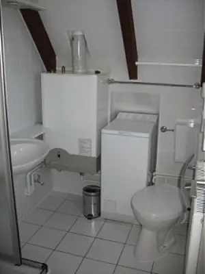 Ein Badezimmer in der Unterkunft Windjammer
