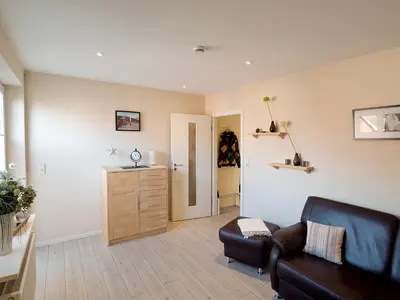 Ein Sitzbereich in der Unterkunft Ferienwohnung Strandstrasse 10, Büsum
