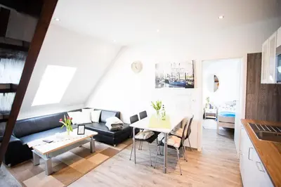 Ein Sitzbereich in der Unterkunft Ferienwohnungen in Wremen