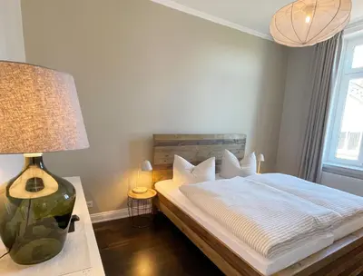 Ein Bett oder Betten in einem Zimmer der Unterkunft Seaside Apartments Austernbank