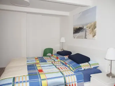 Ein Bett oder Betten in einem Zimmer der Unterkunft Döser Hus