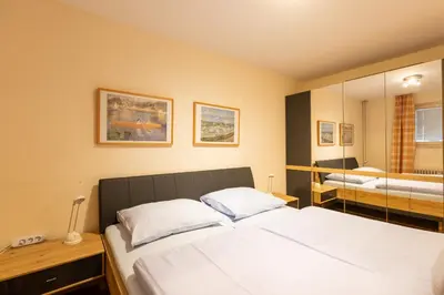Ein Bett oder Betten in einem Zimmer der Unterkunft Haus Pacific, Whg 13