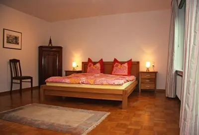 Ein Bett oder Betten in einem Zimmer der Unterkunft Villa Ludwig Fewo