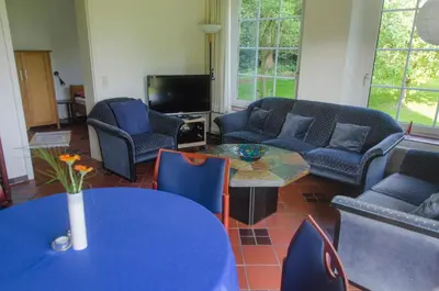 Ein Sitzbereich in der Unterkunft Der Deichhof - Ferienwohnungen