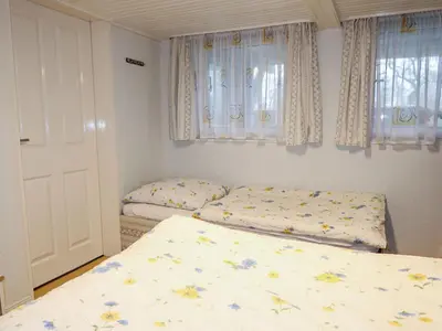 Ein Bett oder Betten in einem Zimmer der Unterkunft Apartment Osterende-2 by Interhome