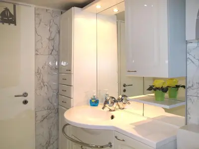 Ein Badezimmer in der Unterkunft Apartment Osterende-2 by Interhome