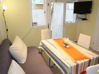 TV/Unterhaltungsangebot in der Unterkunft Apartment Osterende-2 by Interhome