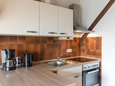 Küche/Küchenzeile in der Unterkunft Apartment Nordsee-Ferienhaus-4 by Interhome