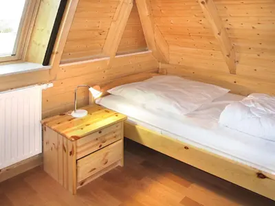 Ein Bett oder Betten in einem Zimmer der Unterkunft Holiday Home Cuxland Ferienpark-2 by Interhome