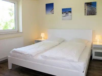 Ein Bett oder Betten in einem Zimmer der Unterkunft Apartment Cuxland Ferienpark-1 by Interhome