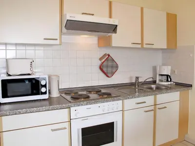Küche/Küchenzeile in der Unterkunft Apartment Cuxland Ferienpark-1 by Interhome