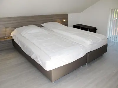 Ein Bett oder Betten in einem Zimmer der Unterkunft Apartment Cuxland Ferienpark-2 by Interhome