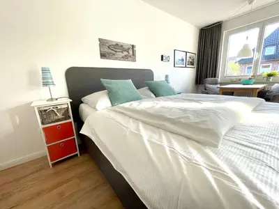Ein Bett oder Betten in einem Zimmer der Unterkunft Fischerbude