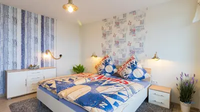 Ein Bett oder Betten in einem Zimmer der Unterkunft Urlaub mit Seesicht Haus Nautic Whg.709