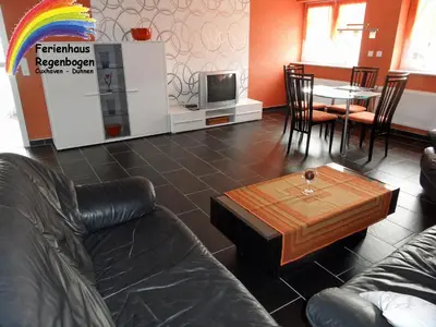 Ein Sitzbereich in der Unterkunft Ferienhaus Regenbogen