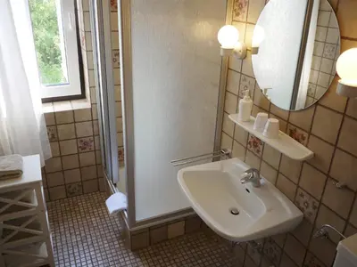 Ein Badezimmer in der Unterkunft Hus Kiek in de See