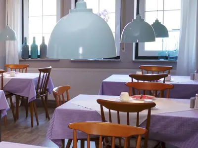Ein Restaurant oder anderes Speiselokal in der Unterkunft Hus Kiek in de See