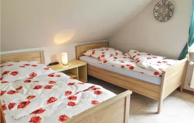 Ein Bett oder Betten in einem Zimmer der Unterkunft Nice Apartment In Osterbruch With Wifi