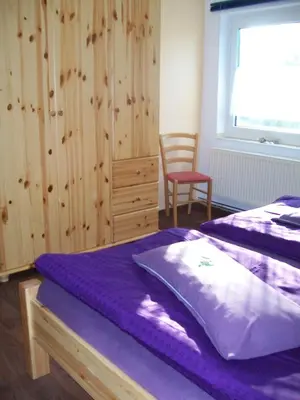 Ein Bett oder Betten in einem Zimmer der Unterkunft Haus Darmstadt