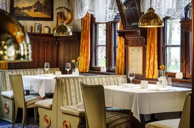 Ein Restaurant oder anderes Speiselokal in der Unterkunft Boutique-Hotel Zur alten Post