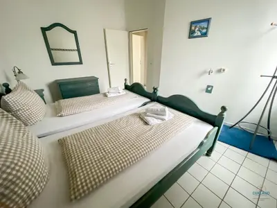 Ein Bett oder Betten in einem Zimmer der Unterkunft Urlaub direkt in der City Marina