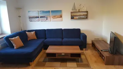Ein Sitzbereich in der Unterkunft Ferienwohnung Waterkant