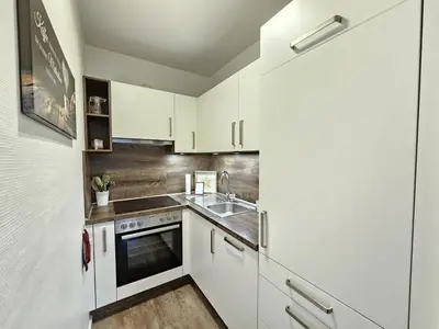 Küche/Küchenzeile in der Unterkunft Appartementhaus Kogge Wohnung 3