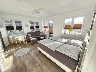 Ein Bett oder Betten in einem Zimmer der Unterkunft Appartementhaus Kogge Wohnung 4