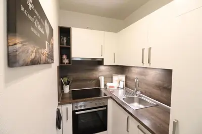 Küche/Küchenzeile in der Unterkunft Appartementhaus Kogge Wohnung 6