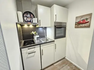 Küche/Küchenzeile in der Unterkunft Appartementhaus Kogge Wohnung 7
