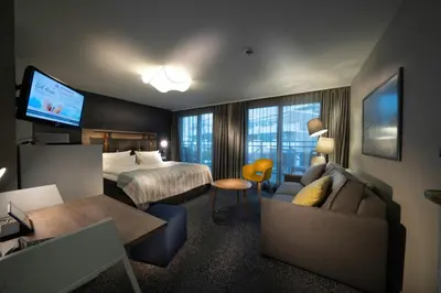Ein Bett oder Betten in einem Zimmer der Unterkunft Strandhotel Duhnen