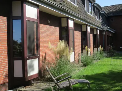 Ein Garten an der Unterkunft Nordseehotel Eymers