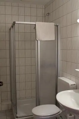 Ein Badezimmer in der Unterkunft Nordseehotel Eymers