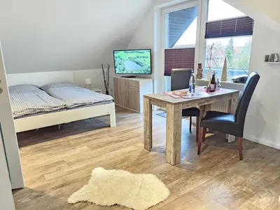 Ein Bett oder Betten in einem Zimmer der Unterkunft Appartementhaus Kogge Wohnung 8