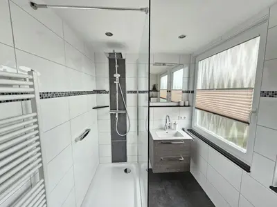 Ein Badezimmer in der Unterkunft Appartementhaus Kogge Wohnung 8