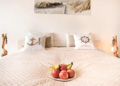 Ein Bett oder Betten in einem Zimmer der Unterkunft Strandbude
