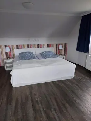 Ein Bett oder Betten in einem Zimmer der Unterkunft Schlummerkasten