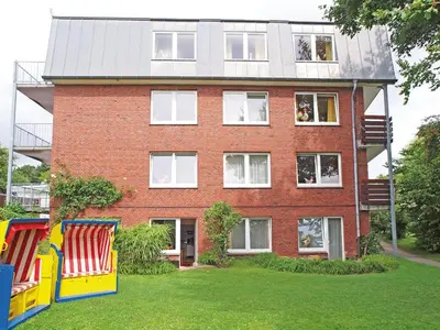 Ein Kinderspielbereich in der Unterkunft Haus Wattenloeper