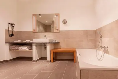 Ein Badezimmer in der Unterkunft Hotel Schelf GmbH & Co. KG