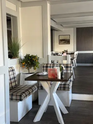 Ein Sitzbereich in der Unterkunft Hotel Gasthof Zur Post