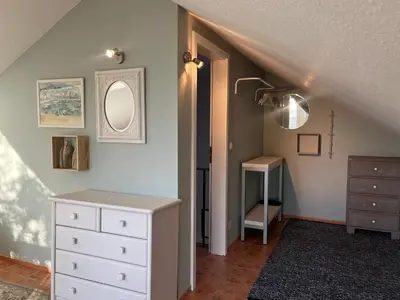 Ein Bett oder Betten in einem Zimmer der Unterkunft Gästehaus am Brockeswald