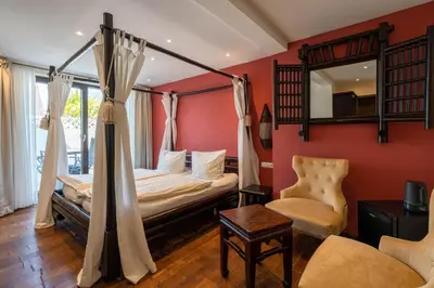 Ein Bett oder Betten in einem Zimmer der Unterkunft Hotel Luina Beach