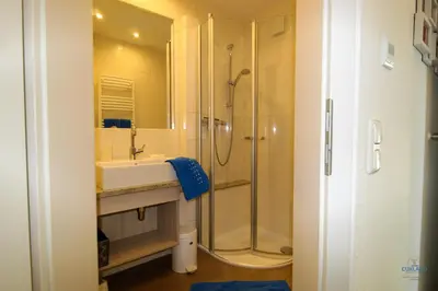 Ein Badezimmer in der Unterkunft Ferienwohnung in der Residenz Vogelsand